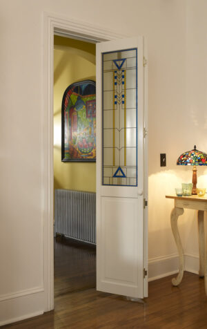 Modern Stained Glass Artiste Bifold Door with Blue and Yellow Accents